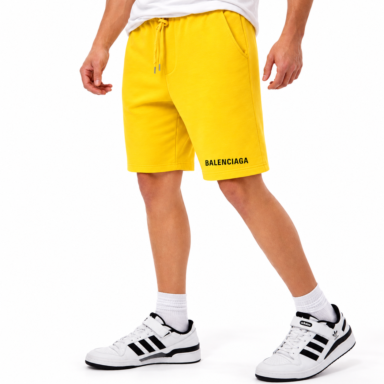 Men's Balenciaga athletic fleece shorts in Yellow, main front view