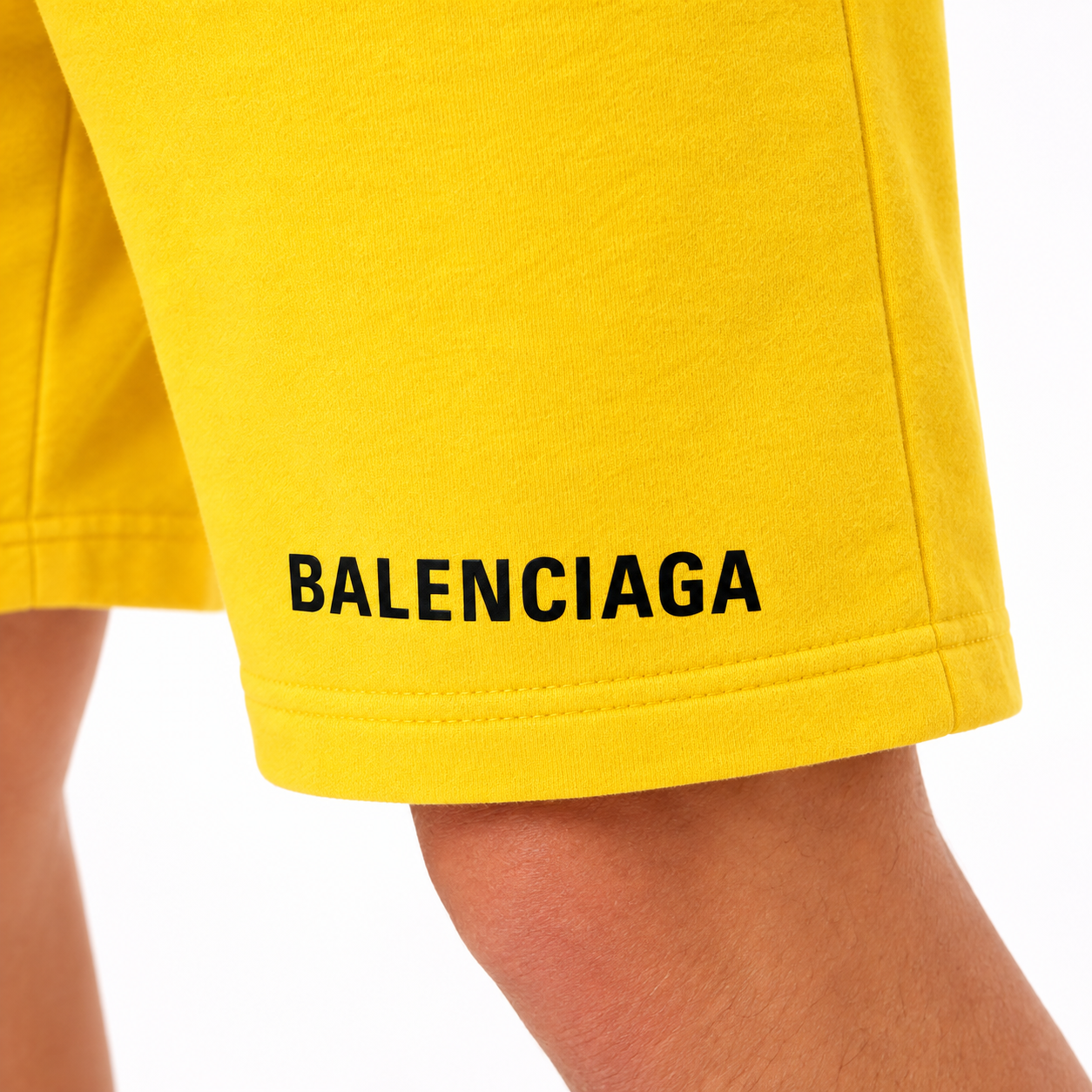 Men's Balenciaga athletic fleece shorts in Yellow, logo detail