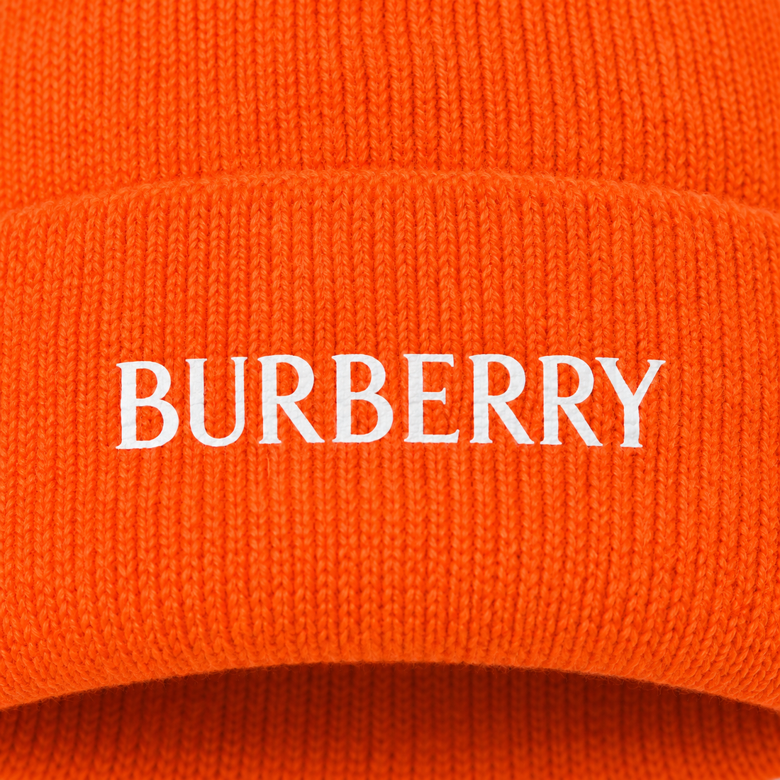 Burberry beanie in Orange, print detail