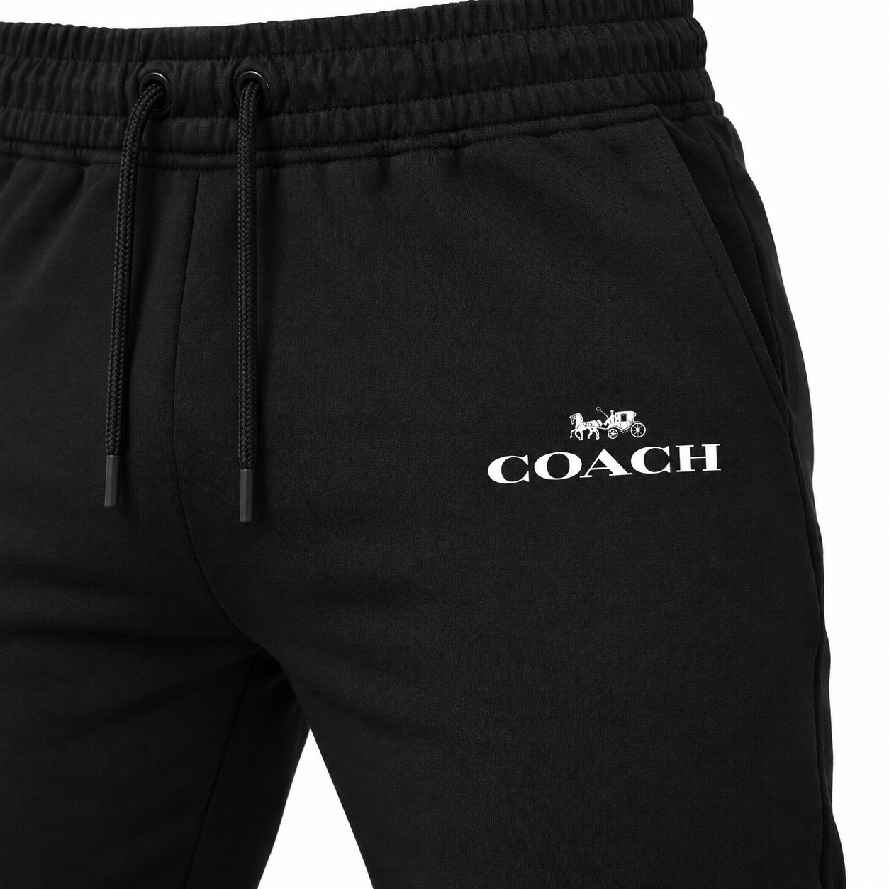 Coach sweatpants in Black, print and waistband detail