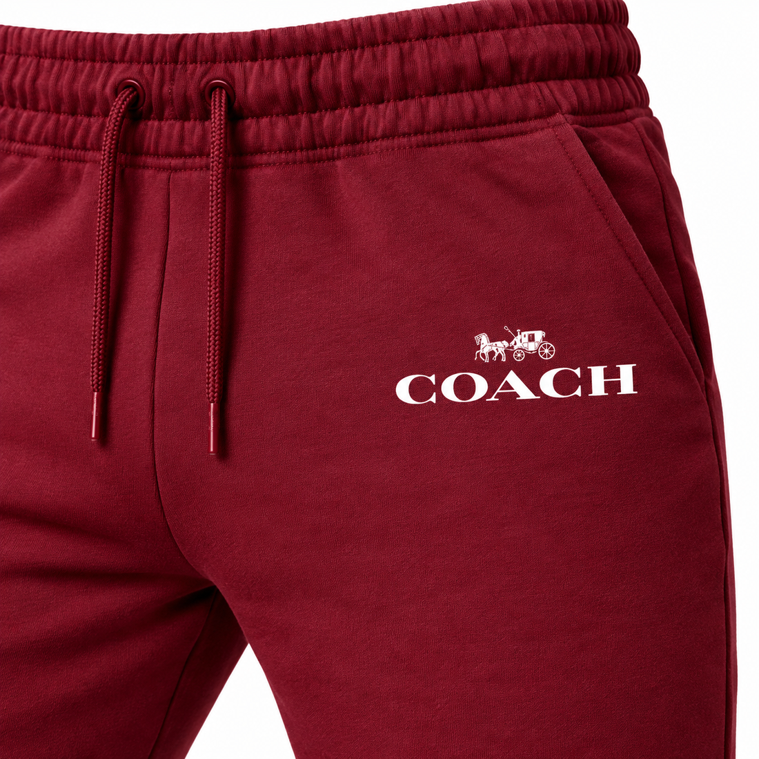 Coach sweatpants in Burgundy, print and waistband detail
