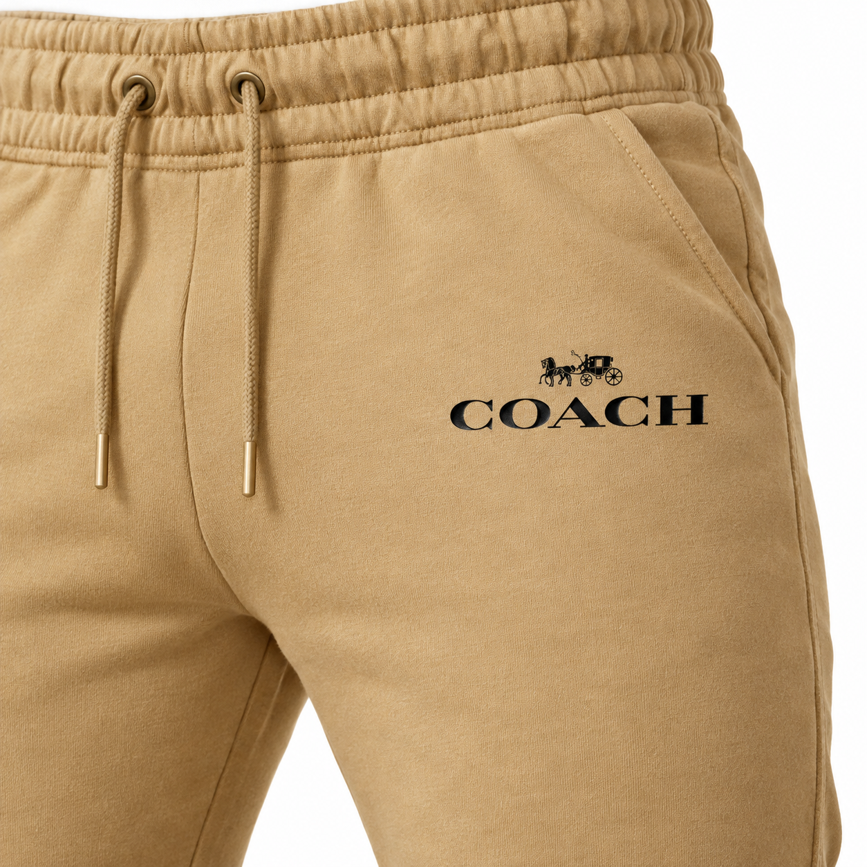 Coach sweatpants in Khaki, print and waistband detail